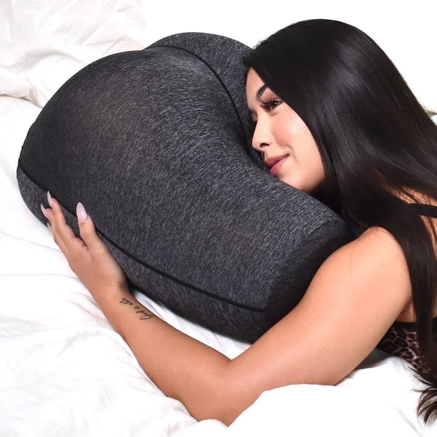 Stomach sleeper using The Buttress Pillow ORT Charcoal model